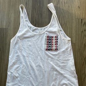 Tank with knit pocket